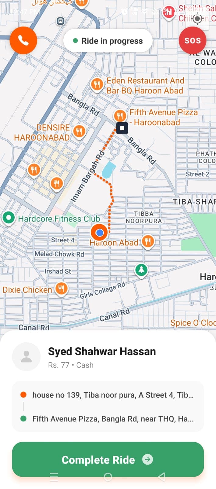The DriveKaro app showing a ride being booked in Haroonabad with the fare shown upfront
